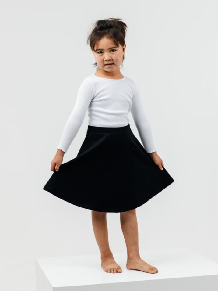 undefined White Sweater with black skirt - image - 00