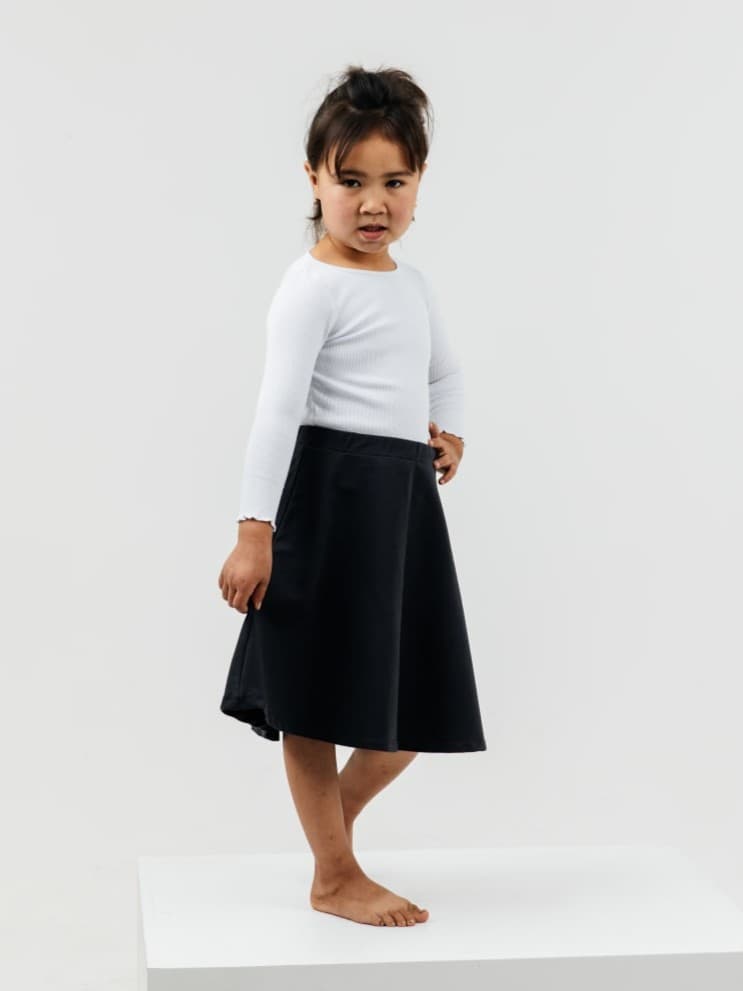 undefined White Sweater with black skirt - image - 01